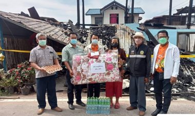 "ลุงปวีณ"ผู้ใจบุญมอบน้ำดื่มอาหารแห้งผู้ประสบวาตภัย 2