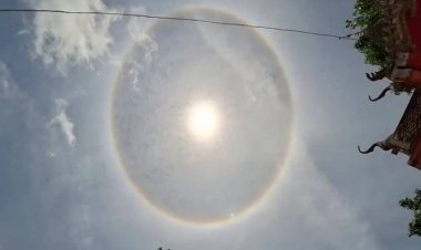 ฮือฮา!พระอาทิตย์ทรงกลดเห็นชัดเจน งานแก้บนเหนือวิหารวัดหลวงพ่อเคลือบ